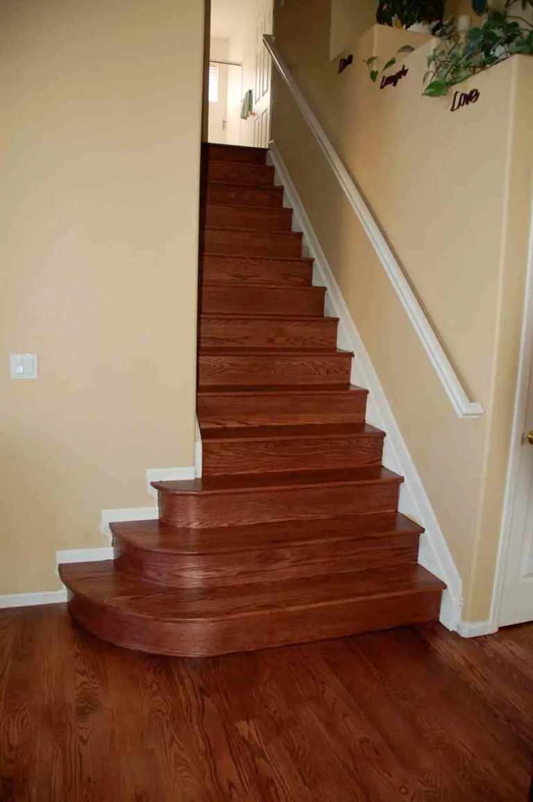 Hardwood staircase with white risers installed in Winter Park, FL