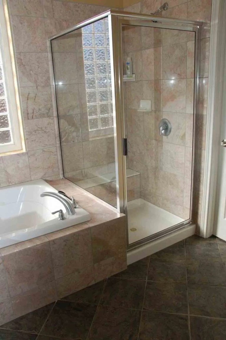 Marble tile shower and freestanding tub bathroom remodel in Orlando, FL