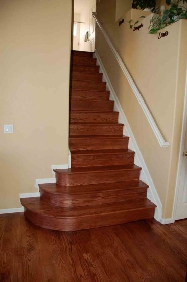 Reddish hardwood staircase installation, Orlando FL