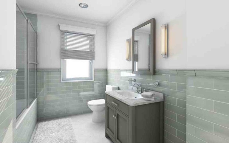 Bathroom remodel with gray tile flooring and vanity in Orlando, FL