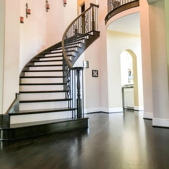 Custom curved wood staircase installation in Orlando, FL home