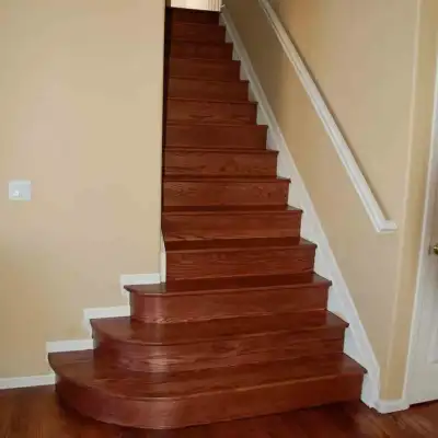 Hardwood staircase with white risers installed in Winter Park, FL