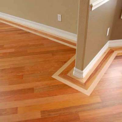 Custom hardwood staircase with glass railing installed in Winter Park, FL home